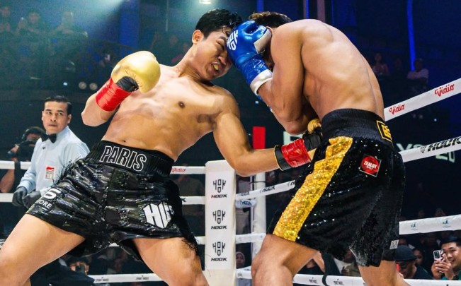 Paris Pernandes saat bertinju dengan Edy Boxing. [Instagram]